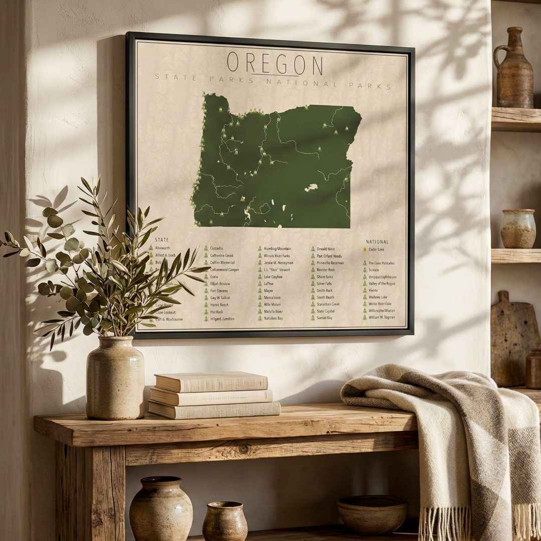 Framed map of Oregon on a wall above a wooden console table with decor items.