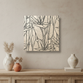 Wood art print with black line art of tropical leaves on a beige background.